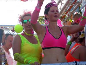 Nice girls with neon clothes on the famous Street Parade 2015 in Zurich, Switzerland